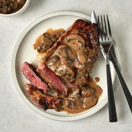 Grilled Steak with Roast Sweet Potato, Vegetables & Mushroom Sauce